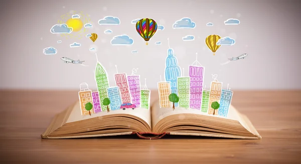 Cityscape drawing on open book — Stock Photo, Image