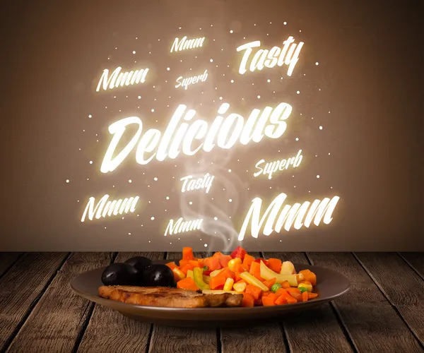 Food plate with delicious and tasty glowing writings — Stock Photo, Image