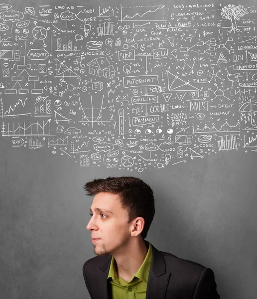 Thoughtful businessman with charts above his head — Stock Photo, Image