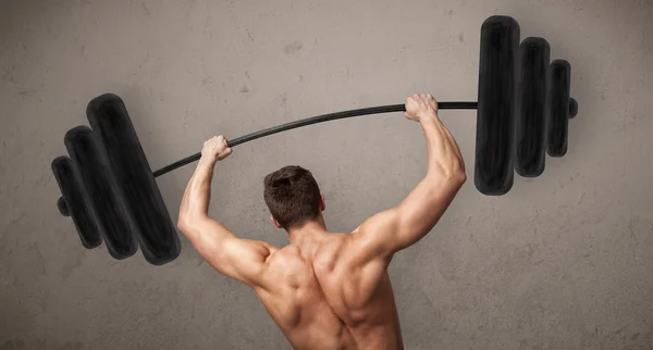 Muscular man lifting weights — Stock Photo, Image