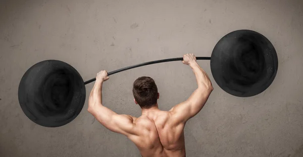 Muscular hombre levantamiento de pesas — Foto de Stock