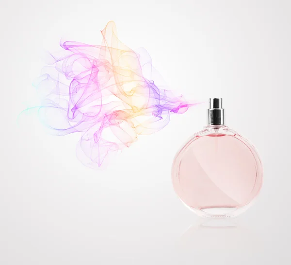 Butelka perfum rozpylanie kolorowy zapach — Zdjęcie stockowe