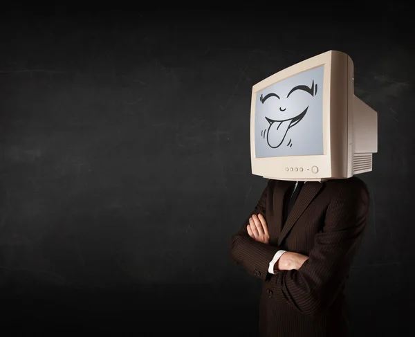 Happy business man with a computer monitor and a smiley face — Stock Photo, Image