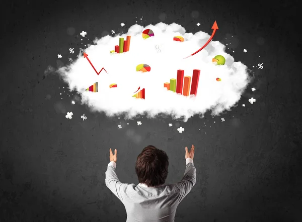 Businessman with charts in a cloud above his head — Stock Photo, Image