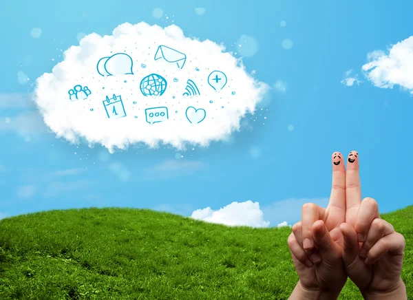 Happy smiley fingers looking at cloud with blue social icons and — Stock Photo, Image