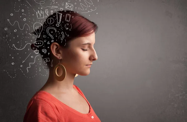 Junges Mädchen denkt mit abstrakten Ikonen auf dem Kopf — Stockfoto