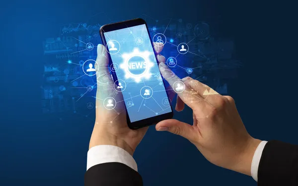 Hand mit Smartphone und Technologiekonzept — Stockfoto