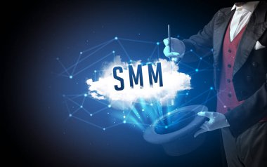 Sihirbaz ya da illüzyonist sihir numarası yapıyor.