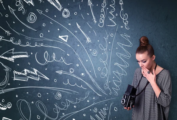 Photographer shooting images while energetic hand drawn lines an — Stock Photo, Image