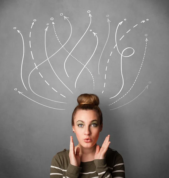 Young woman with arrows coming out of her head — Stock Photo, Image