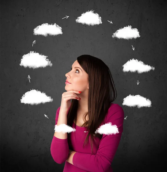 Young woman thinking with cloud circulation around her head — Stock Photo, Image