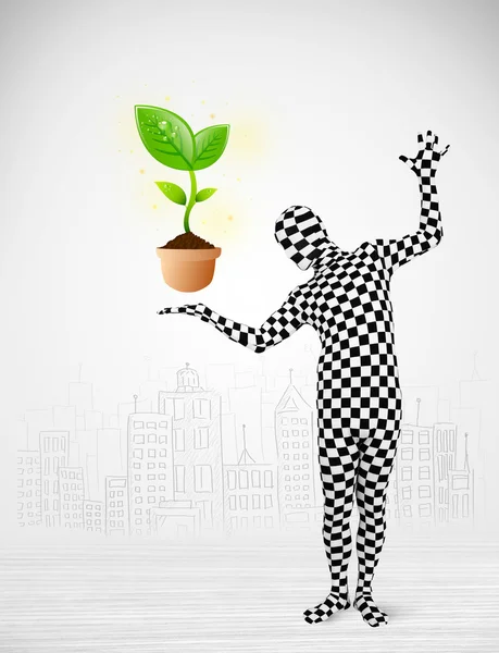 Man in full body suit with eco plant — Stock Photo, Image