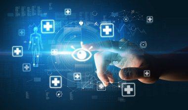 Doktor el, ekranda tıbbi sembollü fütüristik sağlık aygıtı kullanıyor.