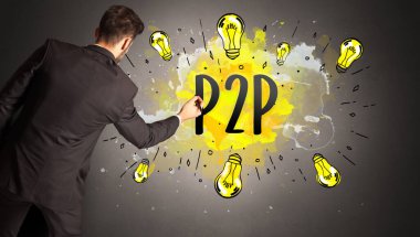 Adam renkli ampul çiziyor.