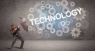 Şemsiye konseptiyle savunma yapan iş adamı