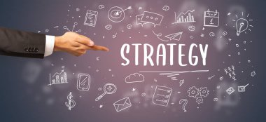 İşletme yazıtlarına işaret eden kırpılmış elin yakın çekimi