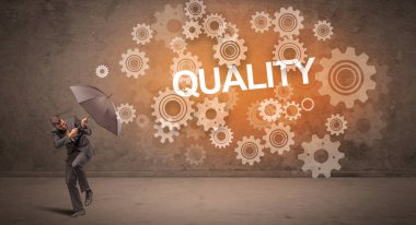 Şemsiye konseptiyle savunma yapan iş adamı