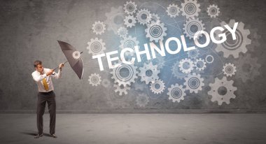 Şemsiye konseptiyle savunma yapan iş adamı