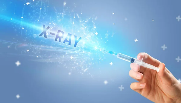 Syringe, medical injection in hand — Stock Photo, Image