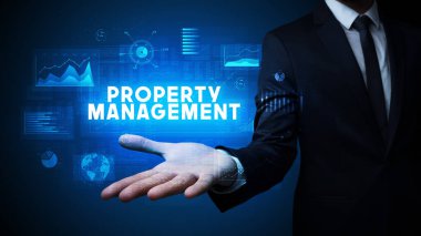 Motivasyon mesajı taşıyan iş adamının eli