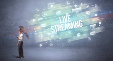 Şemsiyeyle savunma yapan iş adamı