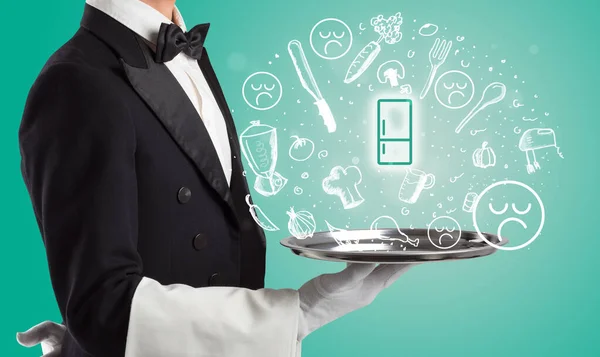 Waiter holding silver tray with food icons above — Stock Photo, Image