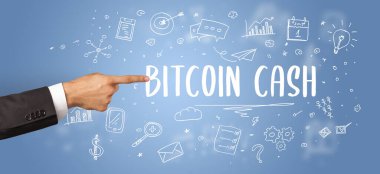 İşletme yazıtlarına işaret eden kırpılmış elin yakın çekimi