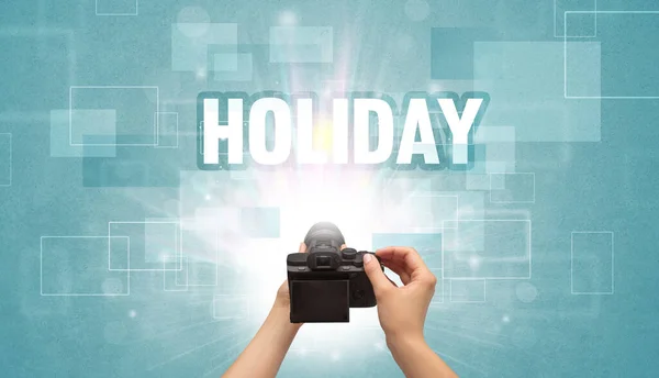Hand holding digital camera, traveling concept — Stock Photo, Image