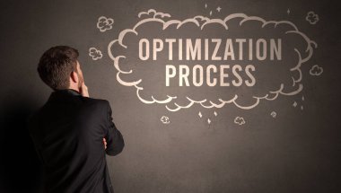 İşadamı yazılı bir bulut çiziyor.