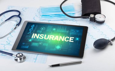 Tablet bilgisayar ve tıbbi malzemeler.