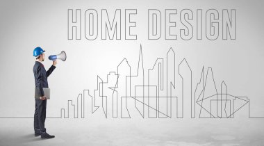 Kasketli bir iş adamı elinde planlar tutuyor