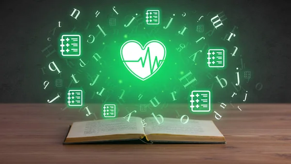 Open medical book with health icons above — Stock Photo, Image