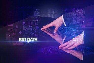 Businessman touching huge display concept