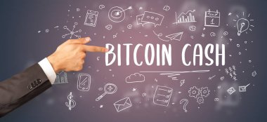 İşletme yazıtlarına işaret eden kırpılmış elin yakın çekimi