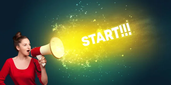 Young woman yelling to loudspeaker concept — Stock Photo, Image