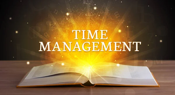 TIME MANAGEMENT inscription coming out from an open book, educational concept