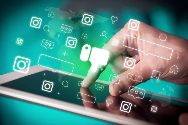 Close Hand Using Tablet Dislike Icons Coming Out Social Media — Stock Photo, Image