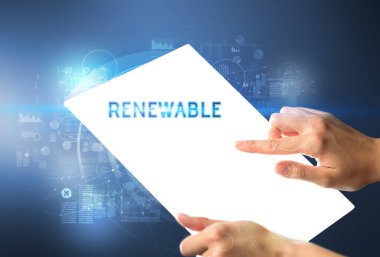 El işi fütüristik tablet. Yenilenebilir yazıtlar, yeni teknoloji kavramı.