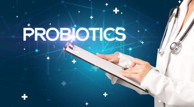 Doktor tıbbî kayıtları PROBIOTICS yazıtları ve tıbbi konseptle dolduruyor.