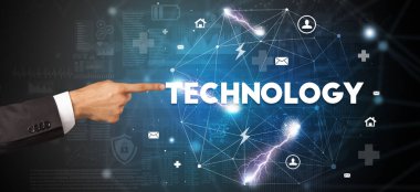 TECHNOLOGY yazıtlarına el işareti, modern teknoloji konsepti