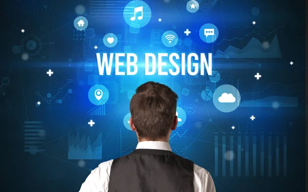 Webデザインの碑文を持つビジネスマンの背面ビュー 近代的な技術の概念 — ストック写真