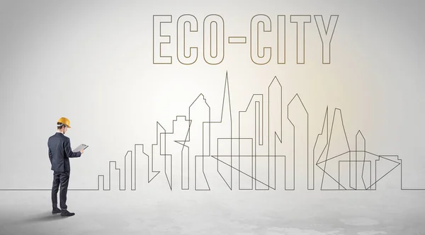 Üzletember Keménykalapban Tervrajzzal Eco City Felirattal Mérnöki Építészeti Koncepcióval — Stock Fotó