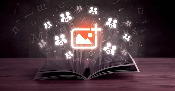 Open book with add photo icons above, social networking concept