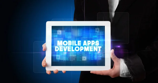 Молодий Бізнесмен Працює Планшеті Показує Напис Mobile Apps Development — стокове фото