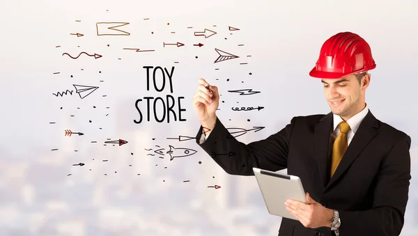 Jóképű Üzletember Sisak Rajz Toy Store Felirat Építési Eladó Koncepció — Stock Fotó