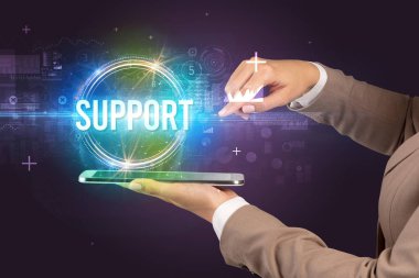 SUPPORT yazıtlı bir dokunmatik ekran yakın plan, yeni teknoloji kavramı