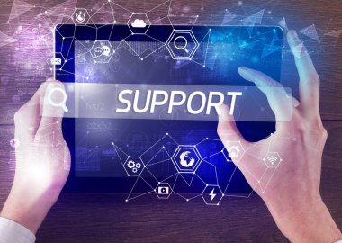 Bir tablet arama SUPPORT yazıt, yüksek teknoloji hesaplama kavramı yakın plan