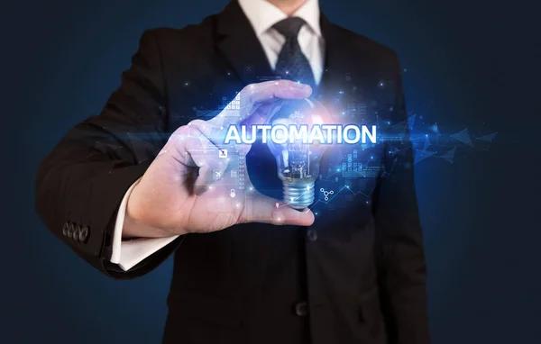 Businessman Holding Light Bulb Automation Inscription Innovative Technology Concept — 스톡 사진