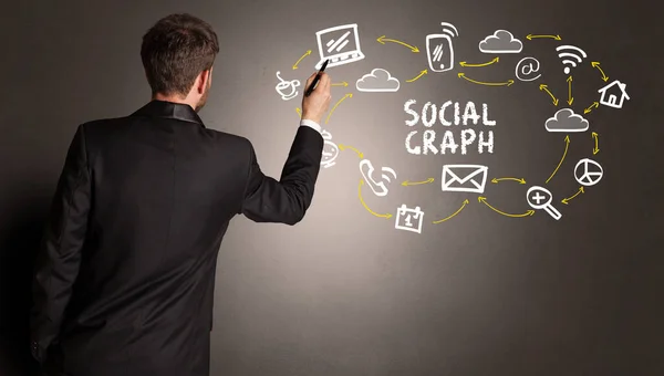 Biznesmen Rysujący Ikony Mediów Społecznościowych Napisem Social Graph Nowa Koncepcja — Zdjęcie stockowe