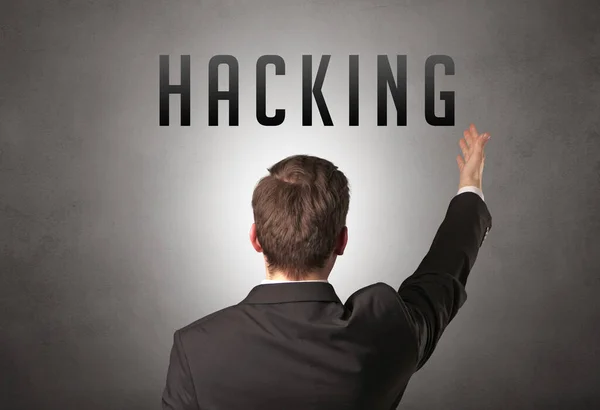 Tylny Widok Biznesmena Napisem Hacking Koncepcja Bezpieczeństwa Cybernetycznego — Zdjęcie stockowe